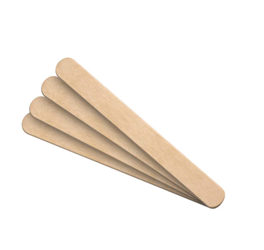 Four wooden tongue depressors arranged in a fan shape.